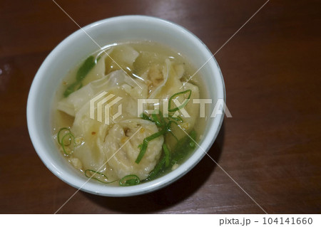 Mie Ayam or Chicken Noodle served in a bowl with meatballs in a restaurant in Semarang, Indonesia. 104141660