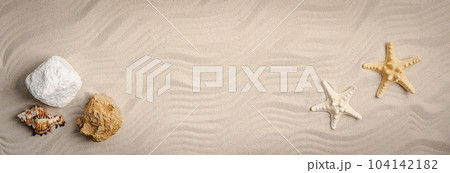 Sea sand with starfish and seashells 104142182