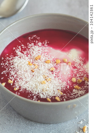 Malabi - traditional Arabic dessert. Milk pudding with rose syrup and nuts. Malabi - traditional Arabic dessert. Milk pudding with rose syrup and nuts. 104142861