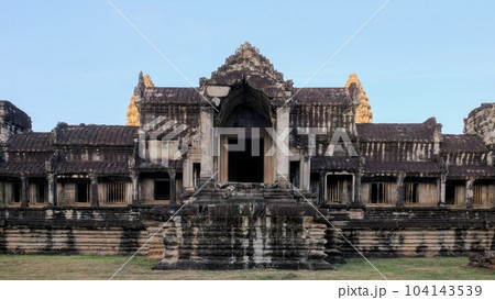 The ruins of a medieval Khmer structure stand alone in the ancient city of Angkor, Cambodia, bearing silent witness to the past. 104143539