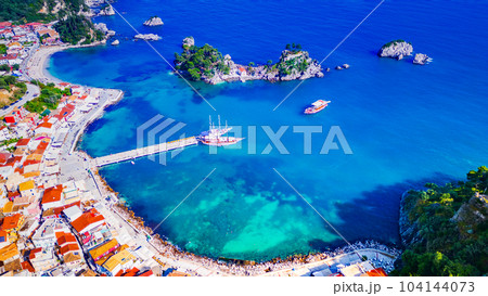 Parga, Greece. Beautiful colorful coastal town in Epirus, Greek holidays. Parga, Greece. Beautiful colorful coastal town in Epirus, Greek holidays. 104144073