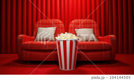 red sofa and popcorn in the home theater red sofa and popcorn in the home theater 104144505
