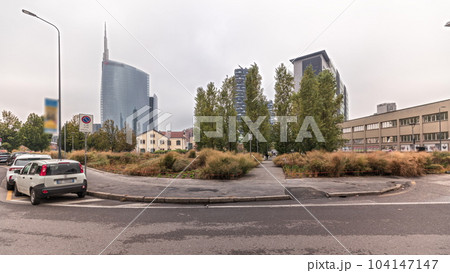 Panorama showing skyscrapers and towers from park with green lawn timelapse in Milan 104147147