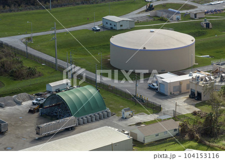Aerial view of industrial park with goods warehouses and logistics centers in city zone from above 104153116