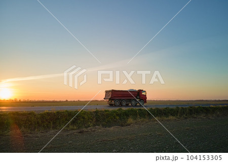 Aerial view of cargo truck driving on highway hauling goods. Delivery transportation and logistics concept 104153305