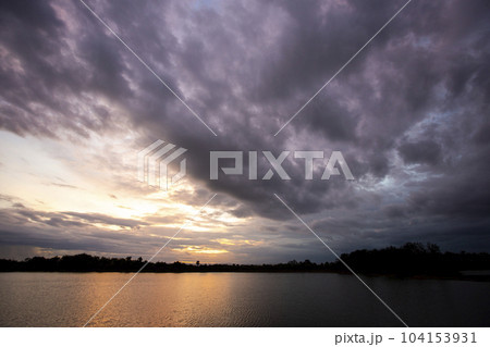 sun rise and sun set sky with cloud on a cloudy day. sun rise and sun set sky with cloud on a cloudy day. 104153931