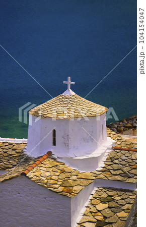 Church tower on Skopelos Island in Greece with copy-space Church tower on Skopelos Island in Greece with copy-space 104154047