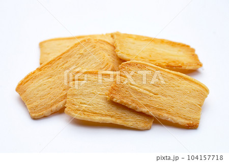 Cheese crispies on white background. 104157718