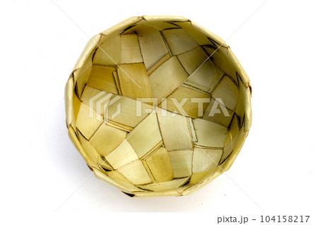 Sticky rice sugar palm leaf basket on white background. 104158217
