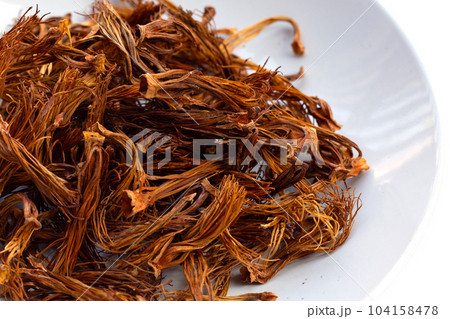 Dried red cotton tree flower 104158478