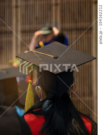 University graduation degree caps during ceremonies on commencement day 104162212