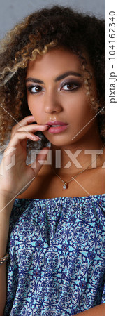 Beauty portrait of African American girl with evening makeup 104162340