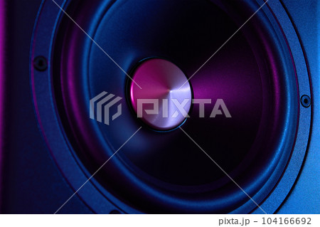Multimedia acoustic sound speaker with neon lighting. Sound audio system on dark background. Multimedia acoustic sound speaker with neon lighting. Sound audio system on dark background. 104166692