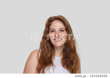 Beautiful mid adult woman with curly ginger hairstyle portrait Beautiful mid adult woman with curly ginger hairstyle portrait 104168089