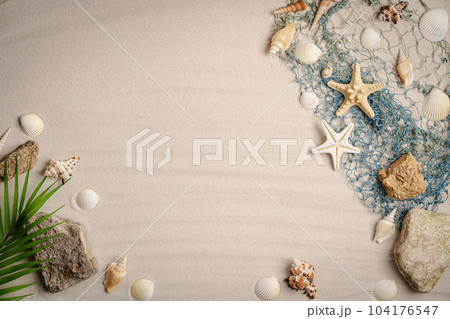 Sea sand with starfish and seashells Sea sand with starfish and seashells 104176547