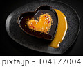 heart-shaped crꣃ洀攀 戀爀쌀»l꧃攀 眀椀琀栀 愀 挀甀猀琀愀爀搀 栀攀愀爀琀 愀渀搀 挀愀爀愀洀攀氀椀稀攀搀 猀甀最愀爀 琀漀瀀瀀椀渀最 漀渀 戀氀愀挀欀 瀀氀愀琀攀Ⰰ 挀爀攀愀琀攀搀 眀椀琀栀 最攀渀攀爀愀琀椀瘀攀 愀椀� 104177004