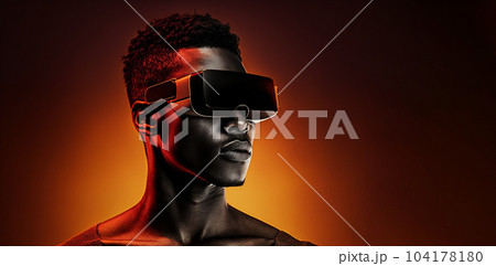 African American man wearing 3d VR headset glasses, watching 360 degree video with virtual reality headset 104178180