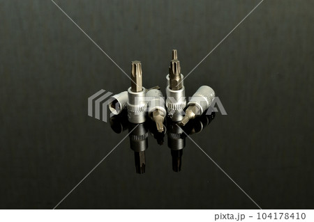 Removable nozzles of different configurations for a screwdriver. 104178410