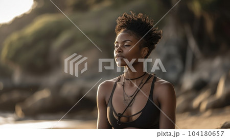 Portrait of afro woman in lotus position at nature location. Healthy african mature woman meditating and sitting in lotus pose. Happy lady in zen pose doing meditation. AI Generative. Portrait of afro woman in lotus position at nature location. Healthy african mature woman meditating and sitting in lotus pose. Happy lady in zen pose doing meditation. AI Generative. 104180657