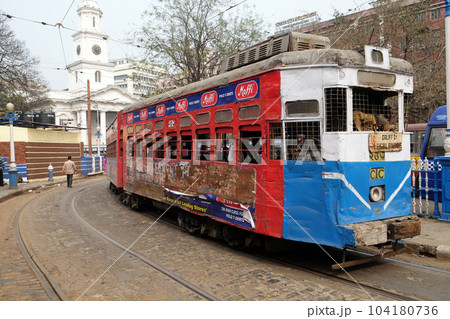 Traditional tram downtown Kolkata. Kolkata is the only Indian city with a tram network, which is operated by the Calcutta Tramways Comp. 104180736