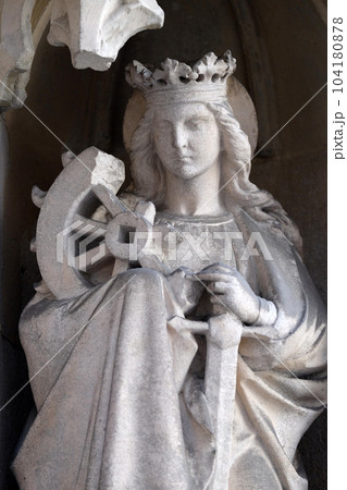 Saint Catherine of Alexandria on the portal of Parish Church of the Holy Blood in Graz, Styria, Austria 104180878
