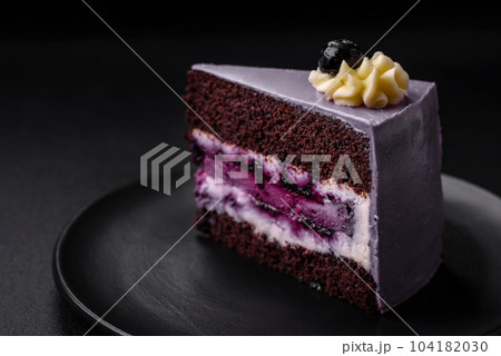 Delicious fresh blueberry or blackcurrant cake with cream cheese Delicious fresh blueberry or blackcurrant cake with cream cheese 104182030