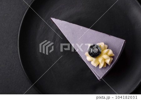 Delicious fresh blueberry or blackcurrant cake with cream cheese Delicious fresh blueberry or blackcurrant cake with cream cheese 104182031
