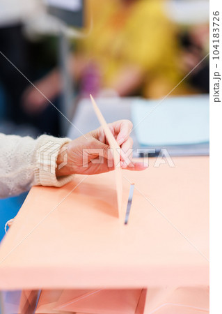 voting democracy background. Unrecognizable hispanic woman hand in candidate election referendum voting democracy background. Unrecognizable hispanic woman hand in candidate election referendum 104183726