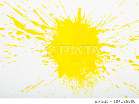 Image of yellow paint spots spilled on background of white paper Image of yellow paint spots spilled on background of white paper 104186886