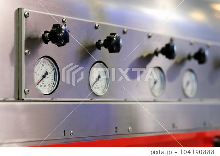 industrial equipment with pressure gauges industrial equipment with pressure gauges 104190888