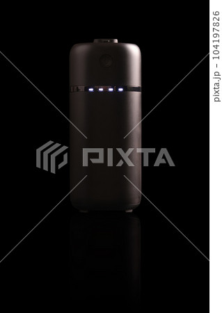 powerbank black on black background with light and reflection 104197826