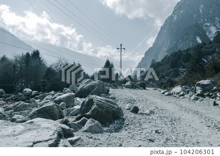 Boulder Rocks besides Himalayan Mountain uphill road. Himalayan Pradesh India Boulder Rocks besides Himalayan Mountain uphill road. Himalayan Pradesh India 104206301