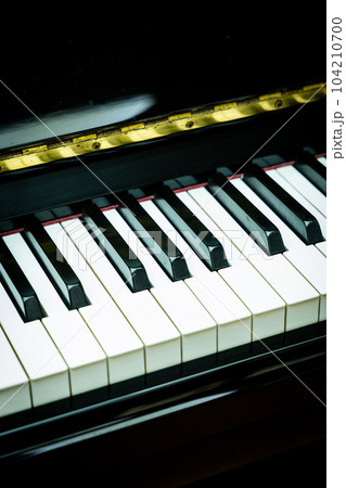 Piano keys close-up selective focus shallow DOF Piano keys close-up selective focus shallow DOF 104210700
