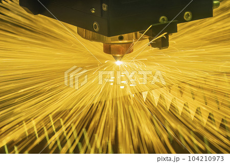 The fiber laser cutting machine cutting  machine cut the metal plate. 104210973