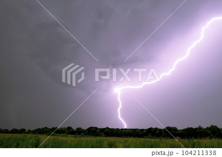 Ray. Lightning storm. Lightning bolt storm. Fork lightning striking. Lightning thunderstorm flash over the night sky. Concept on topic weather, cataclysms (hurricane, Typhoon, tornado, storm). 104211338