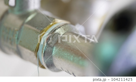 Threaded connection of plumbing pipes with FUM tape sealing 104211425