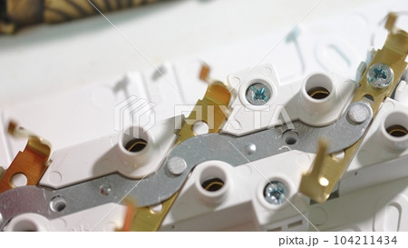 Disassembled electrical outlet. electrician services  104211434