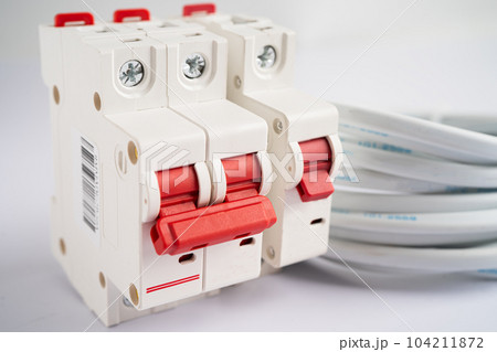 Automatic circuit breaker on white background, control and protect electrical power system. 104211872