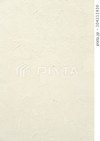クリーム色のモルタルの塗り壁 104211930