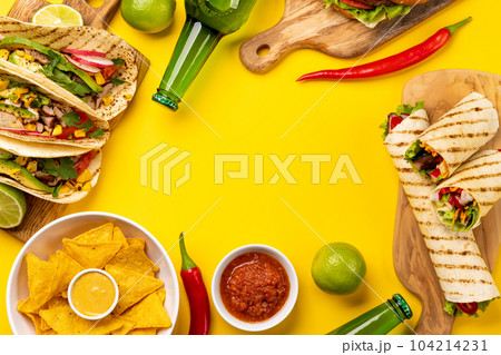 Mexican food featuring tacos, burritos, nachos, burgers Mexican food featuring tacos, burritos, nachos, burgers 104214231