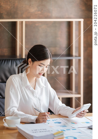 Smart asian Woman working in the Office . Smart asian Woman working in the Office . 104216071