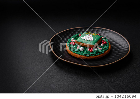 Beautiful Christmas or New Year colorful homemade gingerbread cookies Beautiful Christmas or New Year colorful homemade gingerbread cookies 104216094