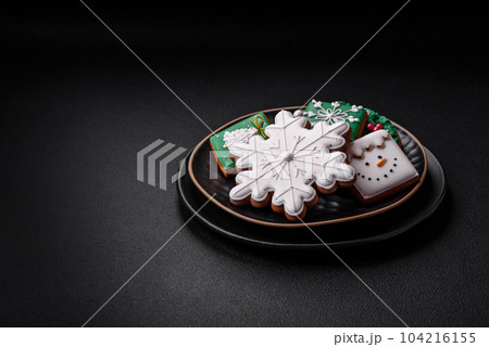 Beautiful Christmas or New Year colorful homemade gingerbread cookies 104216155