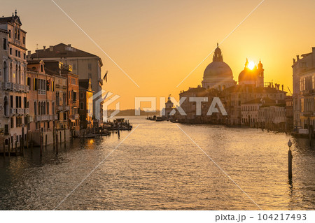 The Grand Canal in Venice with the Santa Maria della Salute basi 104217493
