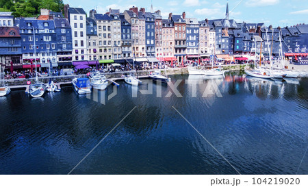 Aerial view of the old harbor in ancient town Honfleur, a resort in Normandy. Yachts (sailboats) in the old harbor Aerial view of the old harbor in ancient town Honfleur, a resort in Normandy. Yachts (sailboats) in the old harbor 104219020