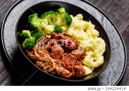 beef mushrooms stew with mashed potato and salad beef mushrooms stew with mashed potato and salad 104224414