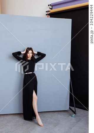 Attractive woman with long brunette hair 104229444