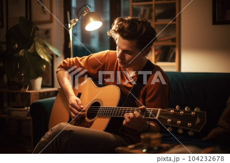 Male Caucasian young adult playing guitar in...のイラスト素材 ...