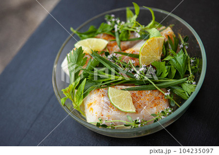 Cooking a spicy fish dish 104235097