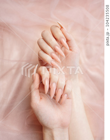 Elegant pastel pink natural manicure. Elegant pastel pink natural manicure. 104235508
